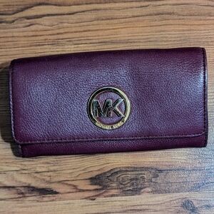 Michael Kors Brown Wallet with Gold MK Logo and Textured Leather